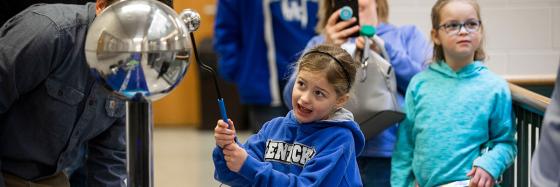 Girl performing experiment